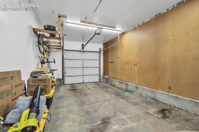 garage featuring a garage door opener