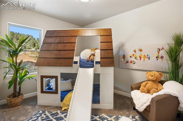 bedroom with carpet and lofted ceiling