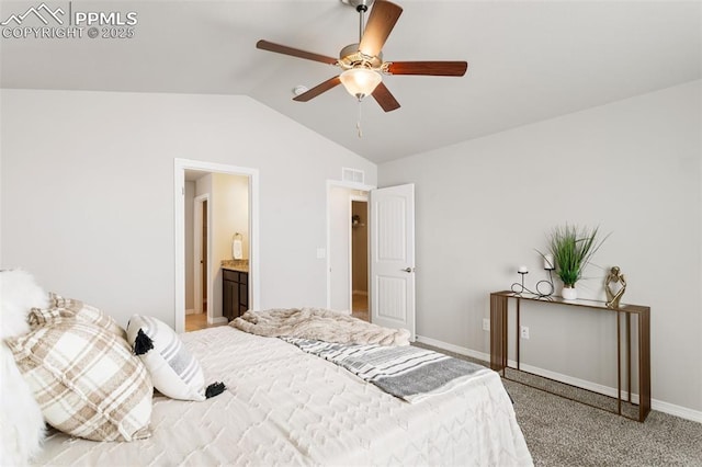 bedroom featuring carpet floors, ceiling fan, lofted ceiling, and connected bathroom