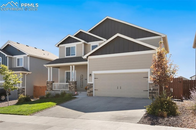 craftsman inspired home with a porch and a garage