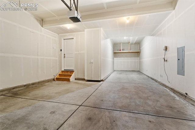 garage featuring a garage door opener and electric panel