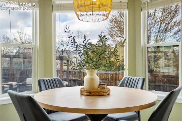 dining area featuring a chandelier