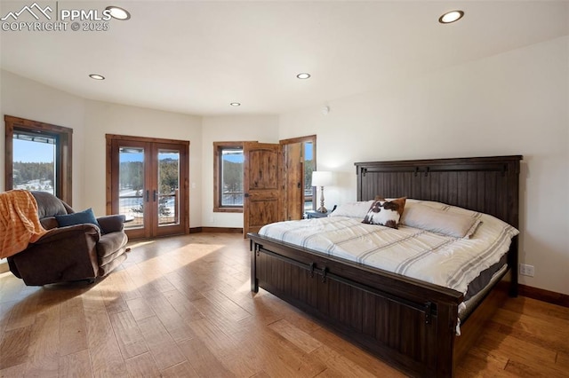 bedroom featuring light wood finished floors, french doors, baseboards, and access to exterior