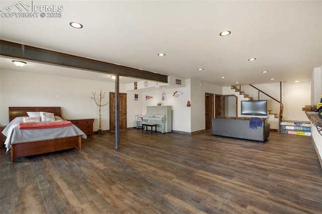 bedroom with baseboards, wood finished floors, visible vents, and recessed lighting