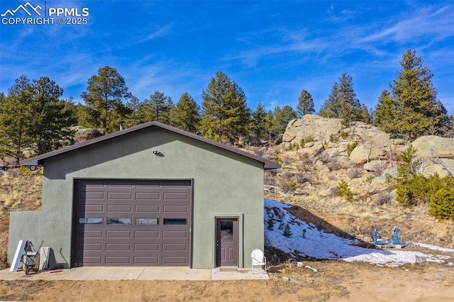 view of detached garage