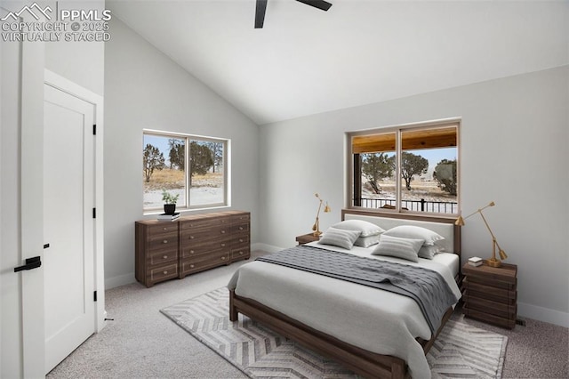 bedroom featuring light colored carpet, high vaulted ceiling, and ceiling fan