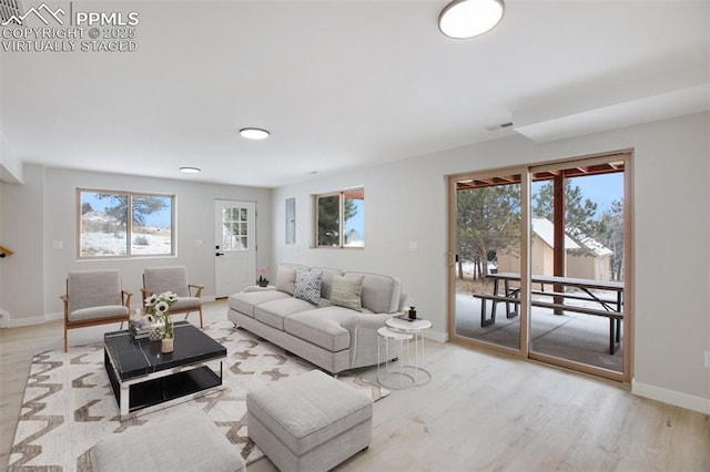 living room featuring light wood-type flooring