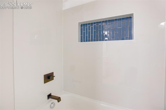 bathroom with shower / bathtub combination