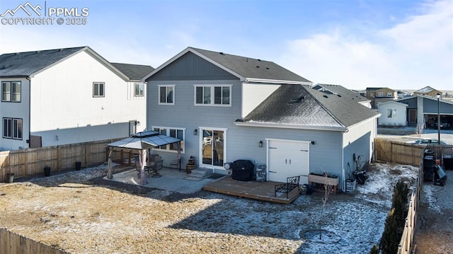 rear view of house with a patio and a gazebo