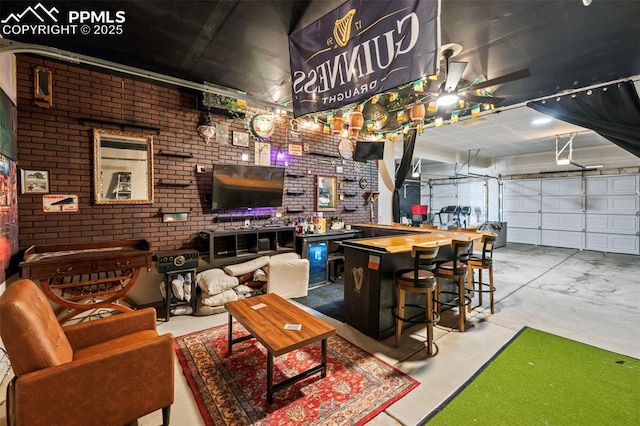 interior space featuring brick wall and concrete floors