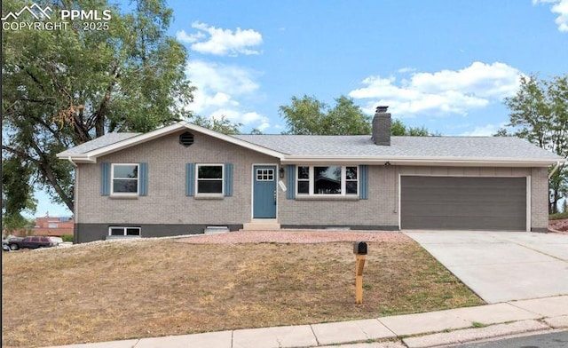 ranch-style home featuring a front yard and a garage