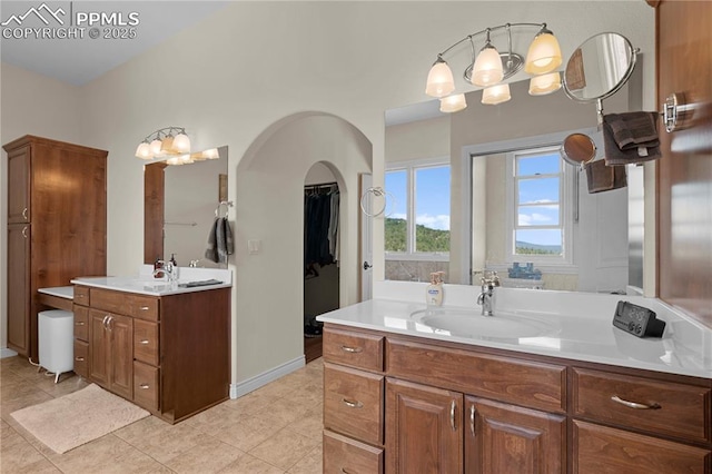 bathroom with tile patterned floors and vanity