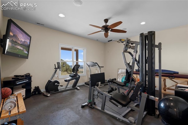 exercise room with ceiling fan