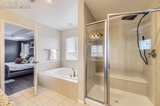 bathroom with tile patterned floors and plus walk in shower