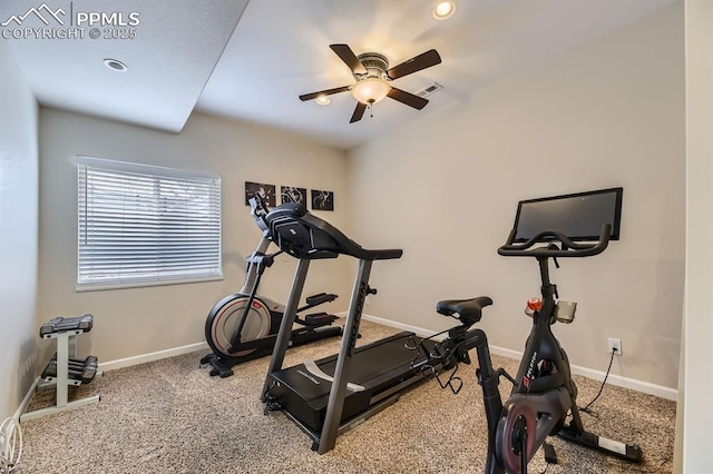 workout room with ceiling fan and carpet floors