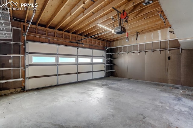 garage featuring a garage door opener