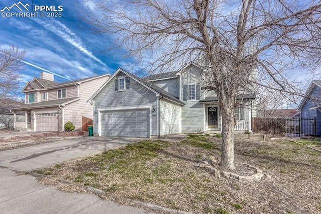 view of front of property with a garage