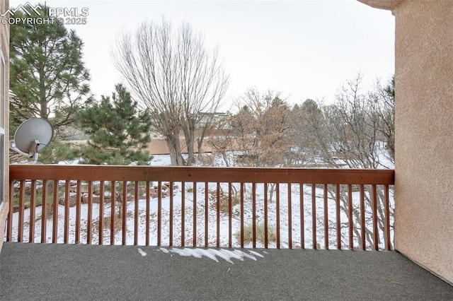 view of snow covered deck