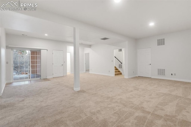 basement with light colored carpet