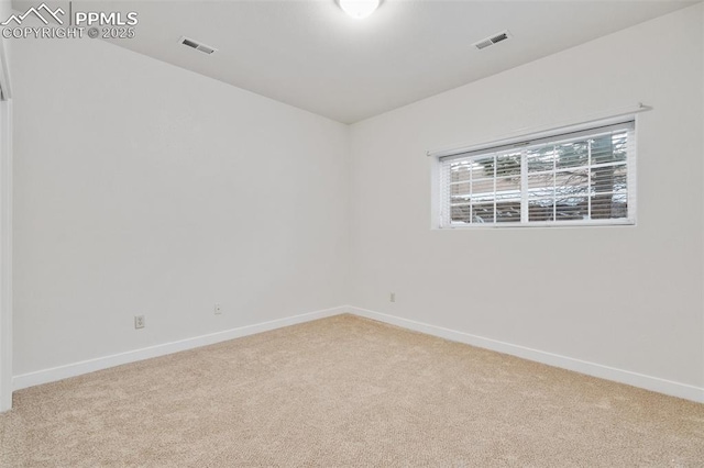 view of carpeted spare room