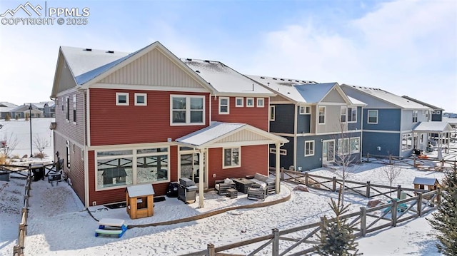 view of snow covered property