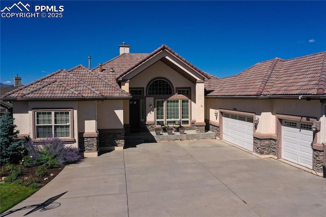 view of front of property featuring a garage