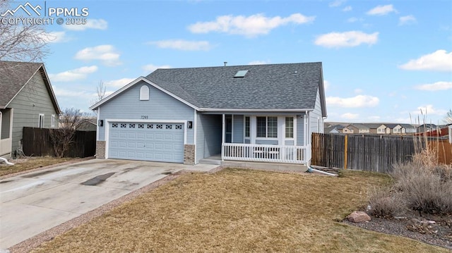 view of front of house featuring a porch, a garage, and a front lawn