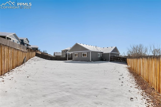 view of yard covered in snow