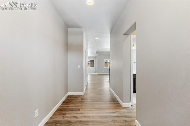 hall featuring light wood-type flooring