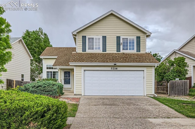 view of front of property with a garage