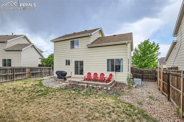 back of property featuring a patio area and a lawn