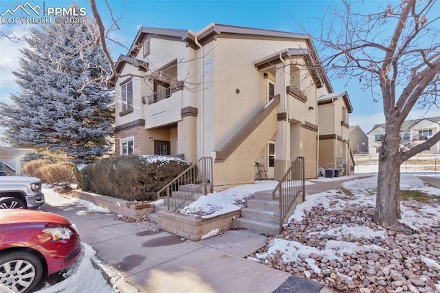 view of snow covered property