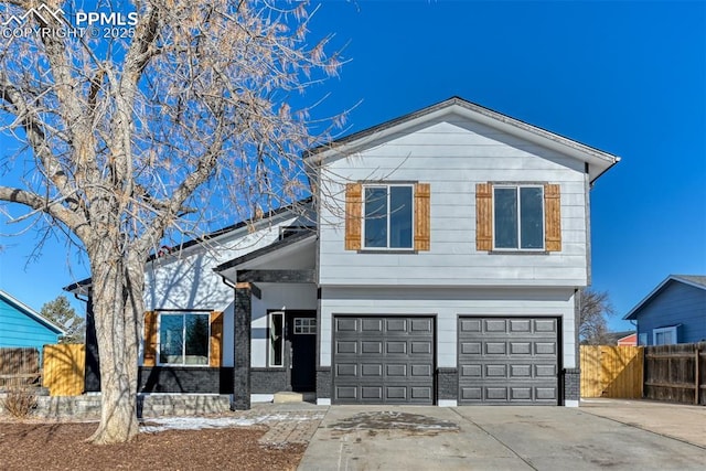 view of front of home with a garage