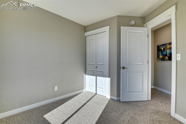 carpeted bedroom with a closet