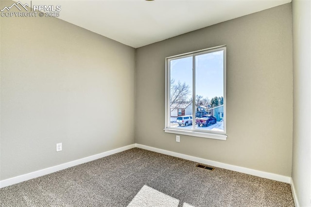 view of carpeted spare room