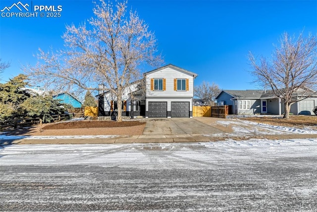 view of front of property featuring a garage