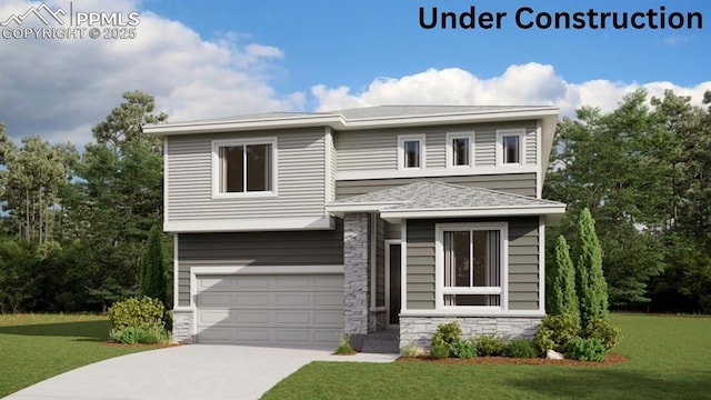 view of front of property with a front yard and a garage