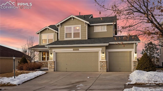 craftsman-style home with a garage