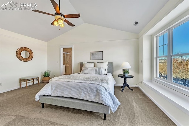 bedroom with connected bathroom, ceiling fan, carpet floors, and vaulted ceiling