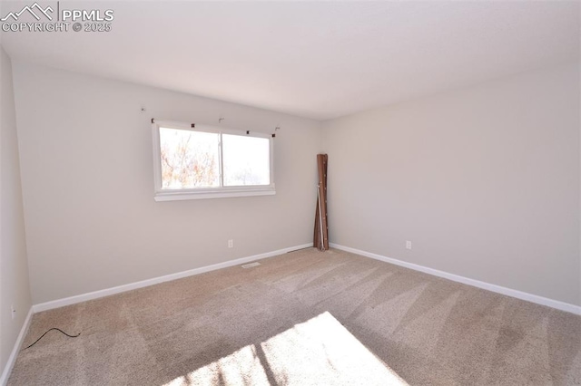 view of carpeted spare room