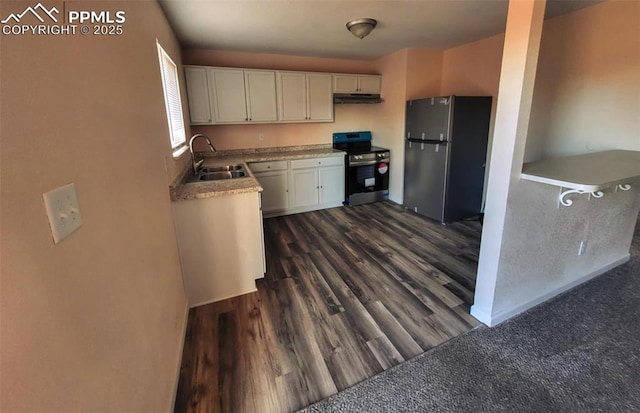 kitchen with stainless steel appliances, a sink, white cabinetry, and under cabinet range hood