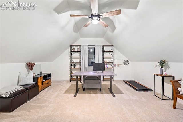 carpeted office featuring ceiling fan and vaulted ceiling