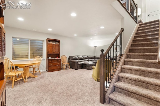 living room featuring carpet floors