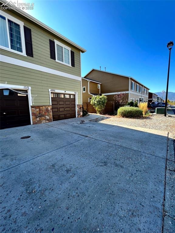 view of home's exterior with a garage