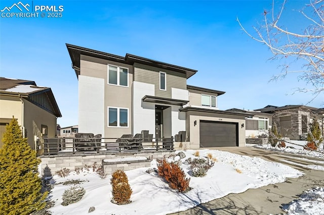 view of front of home with a garage