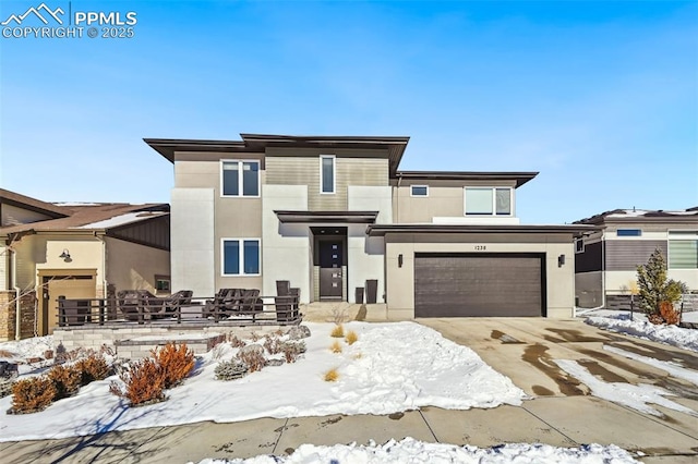 view of front of property featuring a garage