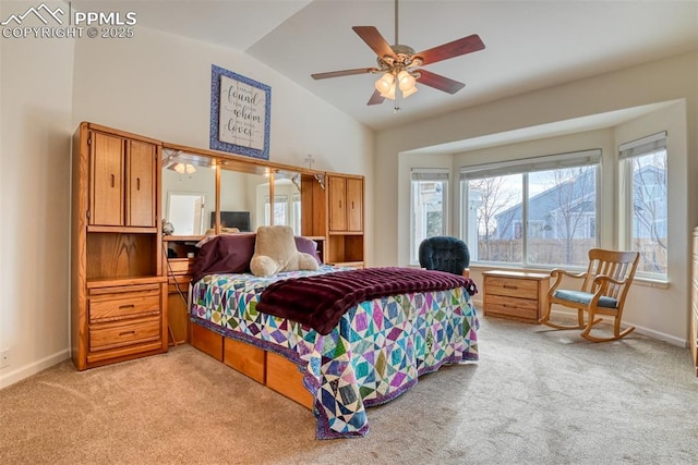 carpeted bedroom featuring ceiling fan and lofted ceiling