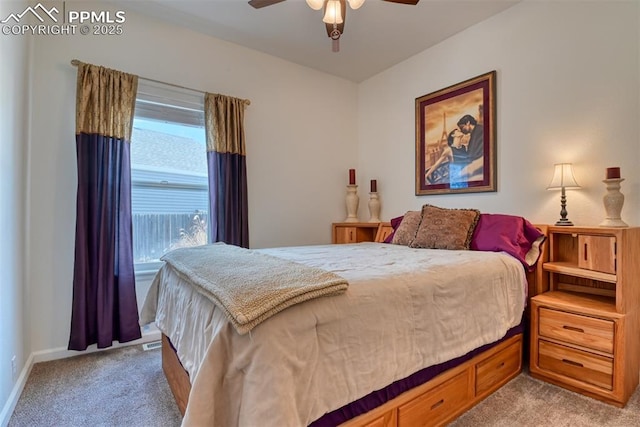 bedroom featuring light carpet and ceiling fan