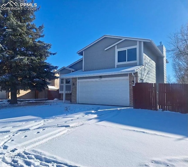 front of property featuring a garage