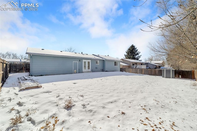 view of snow covered property